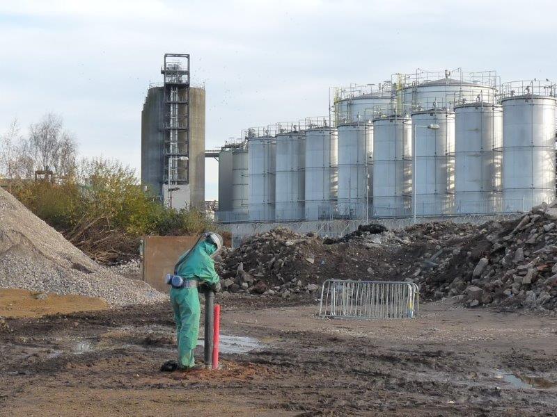 Worker on site in protective suit Worker on site in protective suit
